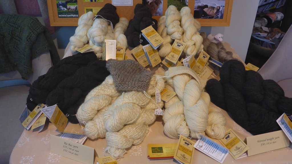 Coopworth yarn in varying weights and a range of natural colors from creamy white through almost black.